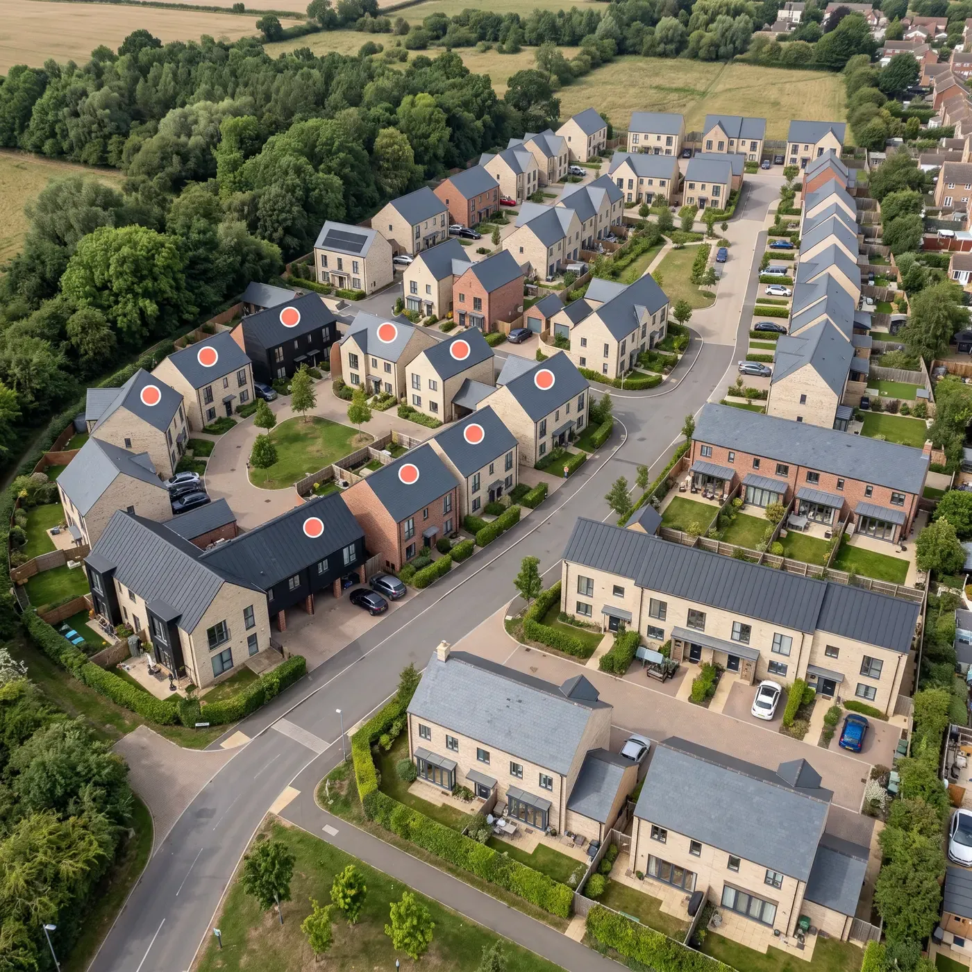 Aerial view of a new housing development with highlighted plots